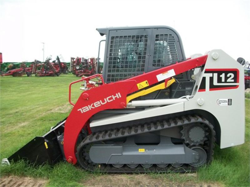 140 tl. Takeuchi TL 140. Погрузчик Takeuchi tl140. Мини погрузчик Takeuchi TL 140. Takeuchi tl10v-2.